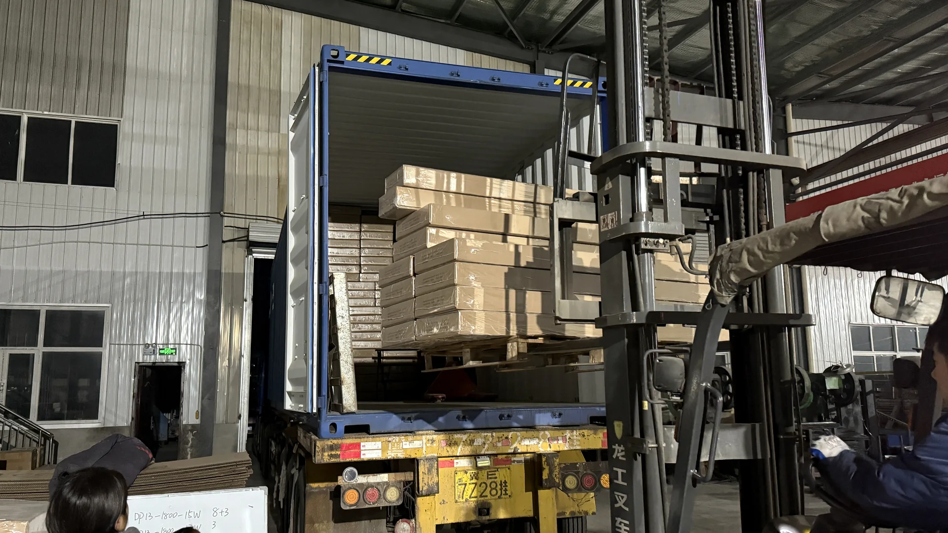 Radiator cartons loaded into an export container