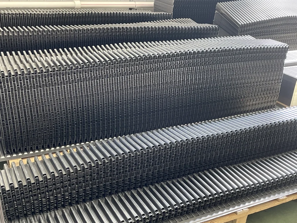 Steel panel radiator components prepared for manufacturing
